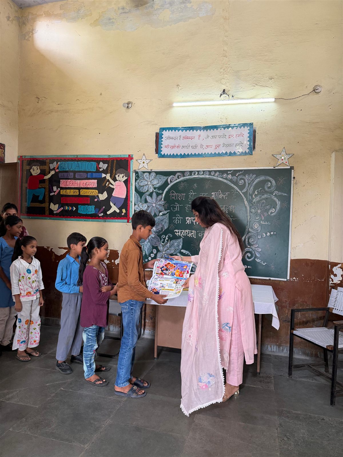 Students lining up to receive their Teddy News issue